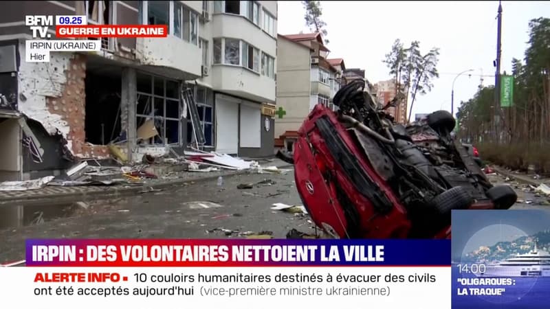 Guerre en Ukraine: à Irpin, les habitants encore présents s’affairent à nettoyer la ville de ses gravats